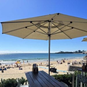 Explore Australia Zoo’s wildlife shows, visit Mooloolaba Beach and Surf Club, enjoy prawns & beer—all with transfers from Brisbane CBD hotels included.